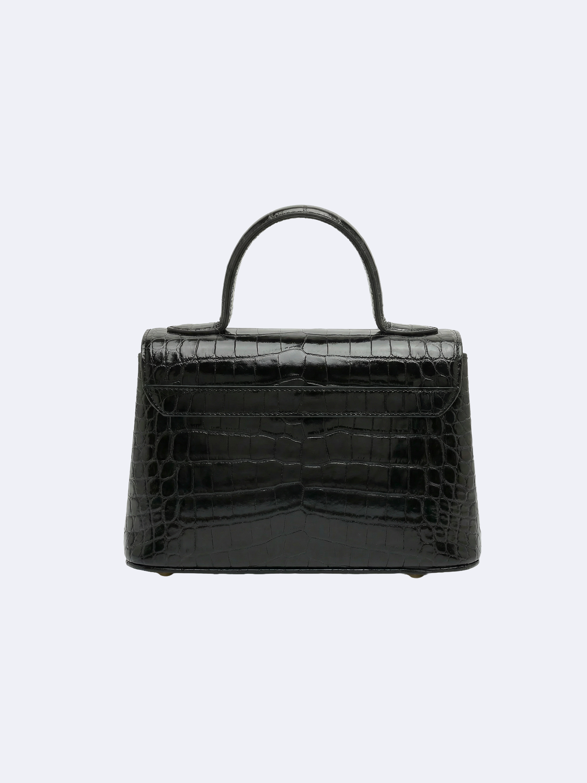 Black handbag in crocodile skin