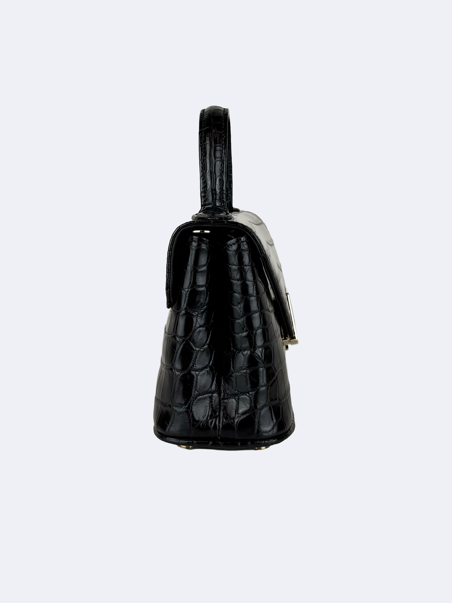 Black handbag in crocodile skin