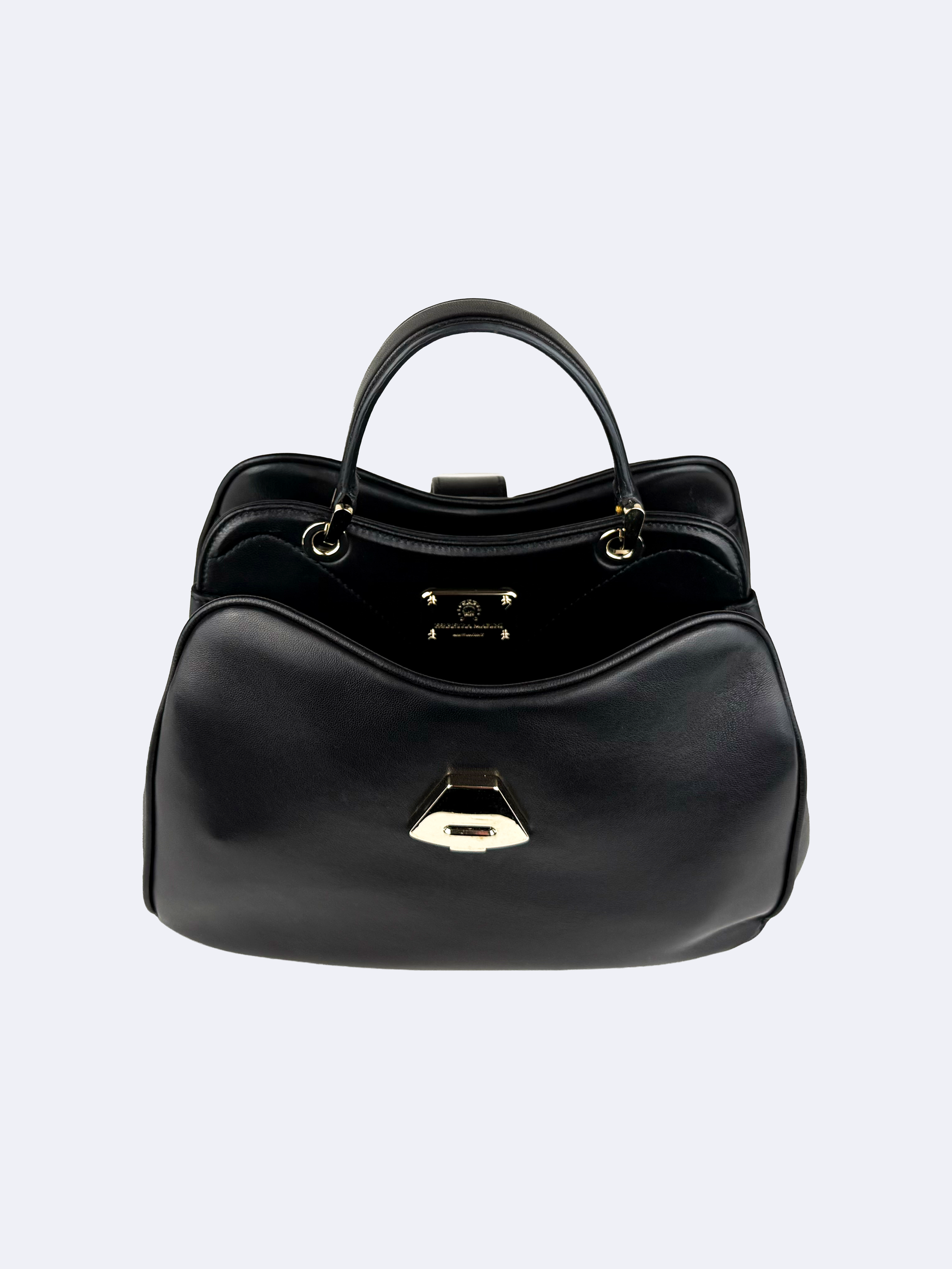 Black handbag in lambskin with gold clasp